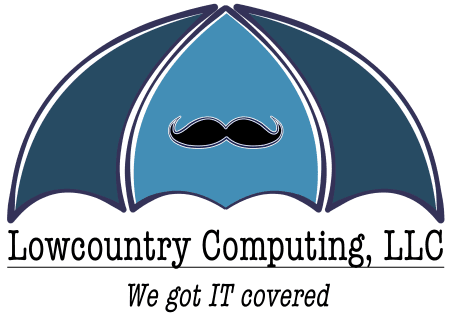We got IT covered - man at keyboard under umbrella - Lowcountry Computing, LLC